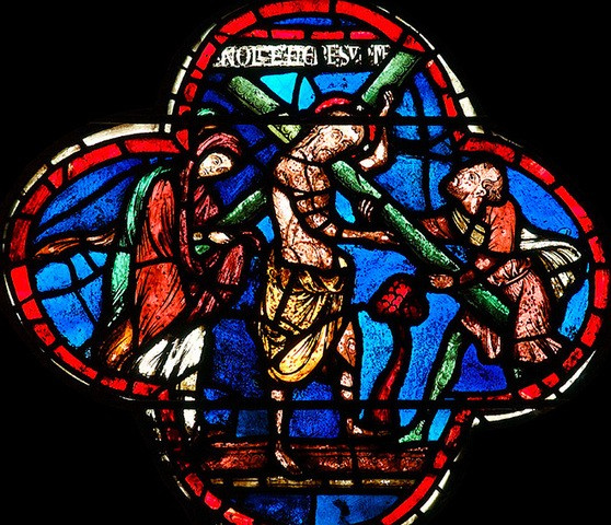 Jesus Carrying His Cross stained glass. Fragment of a stained glass window in the Bourges Cathedral.