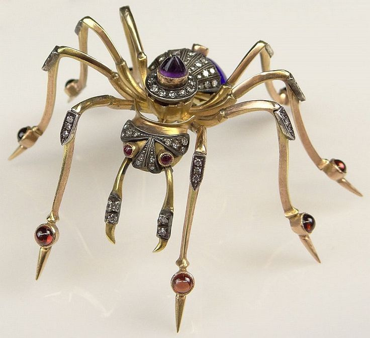 Brooch. Gold, diamonds, amethysts, rubies. Russia, early 20th century.