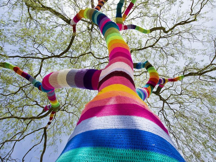 Yarn bombing (aka Guerilla Knitting) - knitted graffiti, invented by American artist Magda Sayeg. He