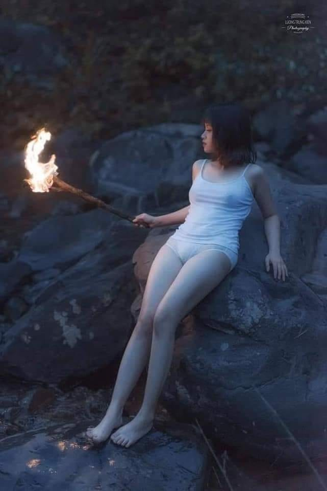 Trung Kien Luong. The girl and the burning torch !