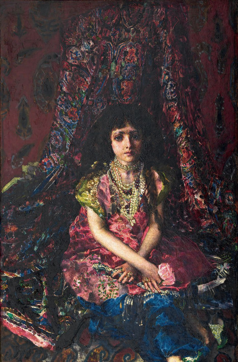 Girl against a Persian carpet