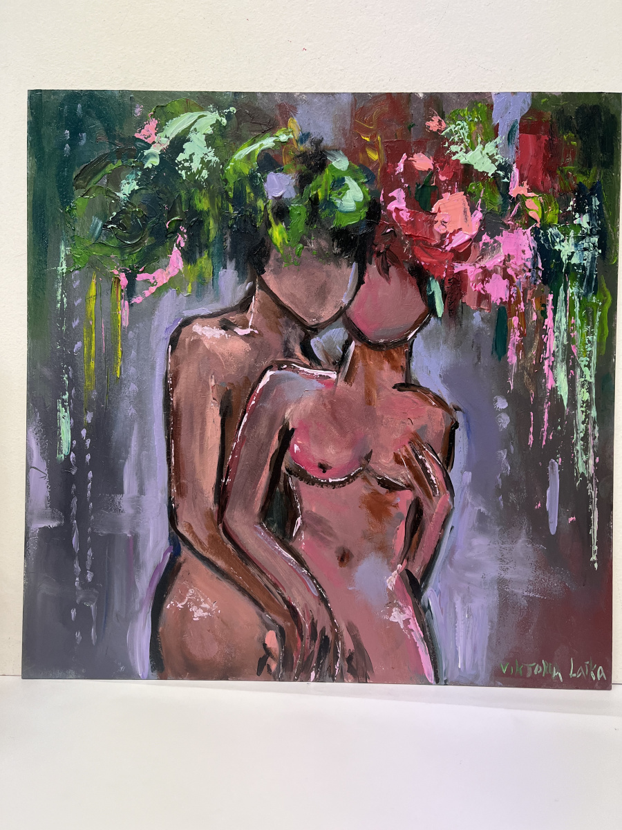 A faceless young couple in flowers
