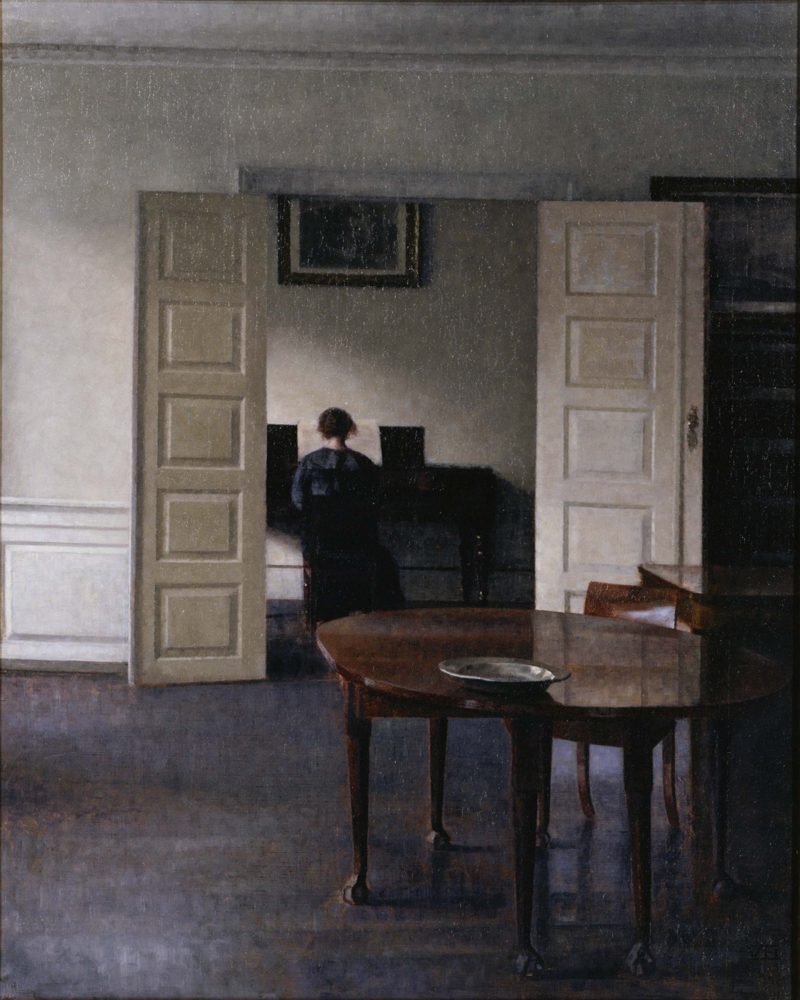 Vilhelm Hammershøi. Interior. Ida playing the piano