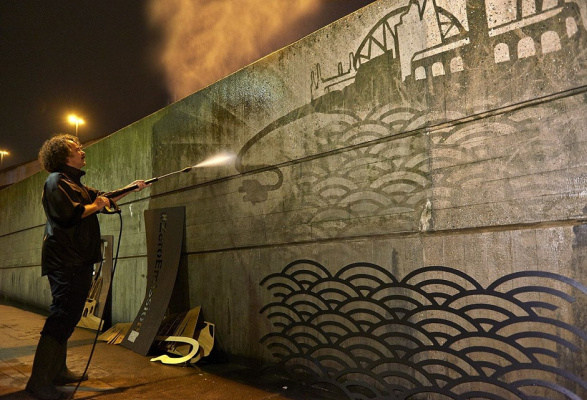 Artist Paul Curtis (Moose) works in the reverse graffiti technique. He came up with this technique, Artist Paul Curtis (Moose) works in the reverse graffiti technique. He came up with this technique,