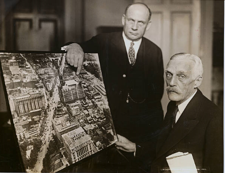 Andrew Mellon and John Russell Pope with the design of the National Gallery building. Andrew Mellon and John Russell Pope with the design of the National Gallery building.