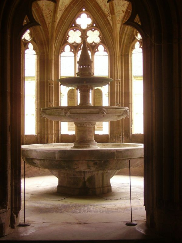 Since the Church needed strict structural hierarchy, the motif of a multilayer fountain symbolizing Since the Church needed strict structural hierarchy, the motif of a multilayer fountain symbolizing