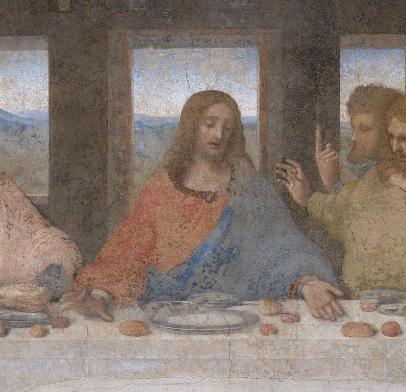 While the right hand of Jesus reaches out to the same dish as the hand of Judas, illustrating the wo While the right hand of Jesus reaches out to the same dish as the hand of Judas, illustrating the wo