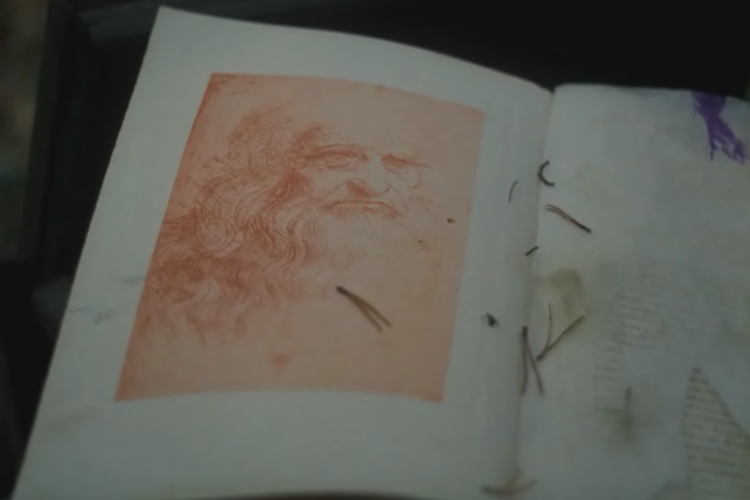 In another episode, the book remains open at the reproduction of the Turin portrait by Leonardo da V In another episode, the book remains open at the reproduction of the Turin portrait by Leonardo da V