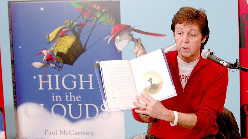 Paul McCartney with his book 'High In The Clouds', 2005. Paul McCartney with his book 'High In The Clouds', 2005.