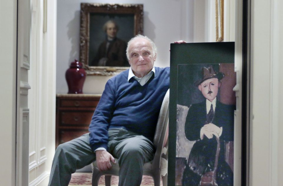 The art dealer David Nahmad with the "Seated Man with a Cane" by Modigliani. Photo: Sipa via AP Imag The art dealer David Nahmad with the "Seated Man with a Cane" by Modigliani. Photo: Sipa via AP Imag