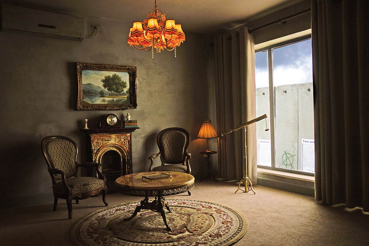 All windows in the Walled Off hotel’s rooms overlook the concrete wall. Photo: banksy.co.uk All windows in the Walled Off hotel’s rooms overlook the concrete wall. Photo: banksy.co.uk